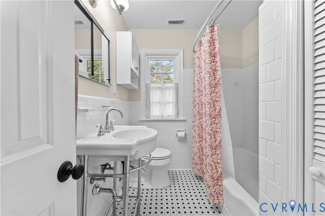 6956 Old Westham Road, Stratford Hills/Cherokee Road, Richmond, VA 23225 Bathroom featuring a white pedestal sink with chrome plumbing, subway tile wall surround, black-and-white mosaic tile flooring, built-in medicine cabinet, and a multi-pane window