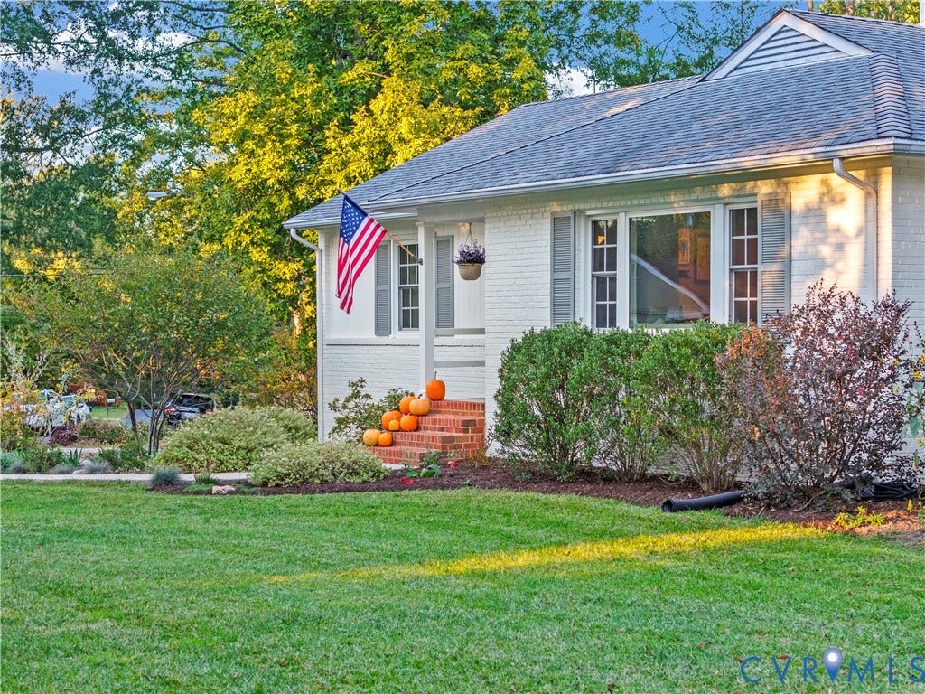 6956 Old Westham Road, Stratford Hills/Cherokee Road, Richmond, VA 23225 White-painted brick exterior featuring a shingled roof, multi-pane windows, decorative shutters, and red brick front steps