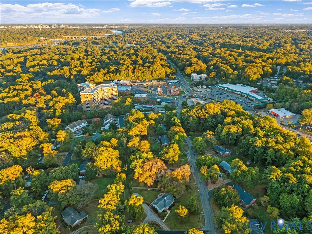 6956 Old Westham Road, Stratford Hills/Cherokee Road, Richmond, VA 23225 Aerial perspective featuring dense mature tree canopy, established residential street layout, and distant horizon backdrop