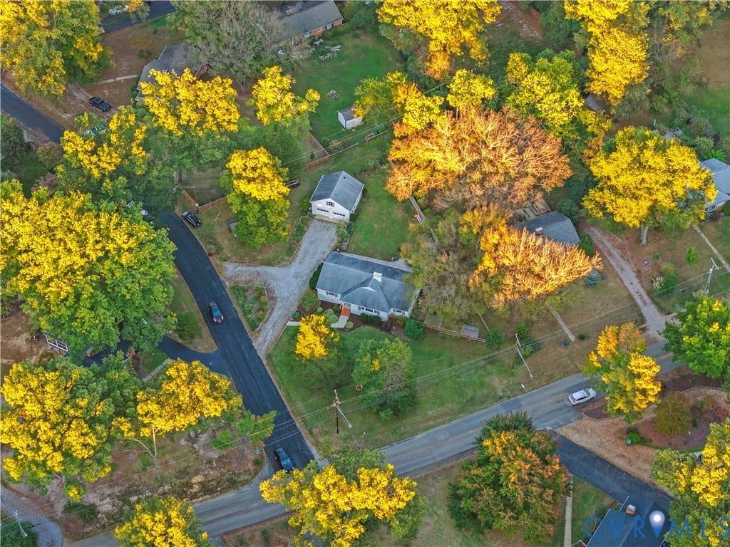 6956 Old Westham Road, Stratford Hills/Cherokee Road, Richmond, VA 23225 Aerial perspective featuring a residential lot with mature trees, a detached garage, and an asphalt driveway