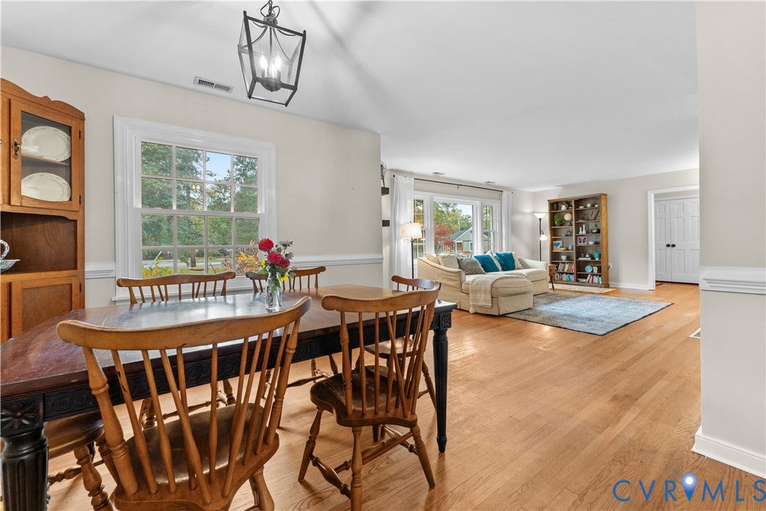 6956 Old Westham Road, Stratford Hills/Cherokee Road, Richmond, VA 23225 Interior space featuring wood-finish flooring, white chair rail molding, multi-pane windows, and a metal lantern-style hanging light fixture