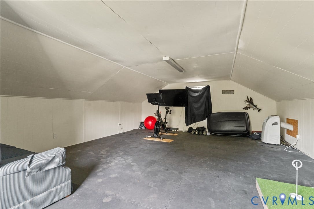 6956 Old Westham Road, Stratford Hills/Cherokee Road, Richmond, VA 23225 Attic space featuring vaulted ceilings, panelled walls, and flooring composed of interlocking foam tiles