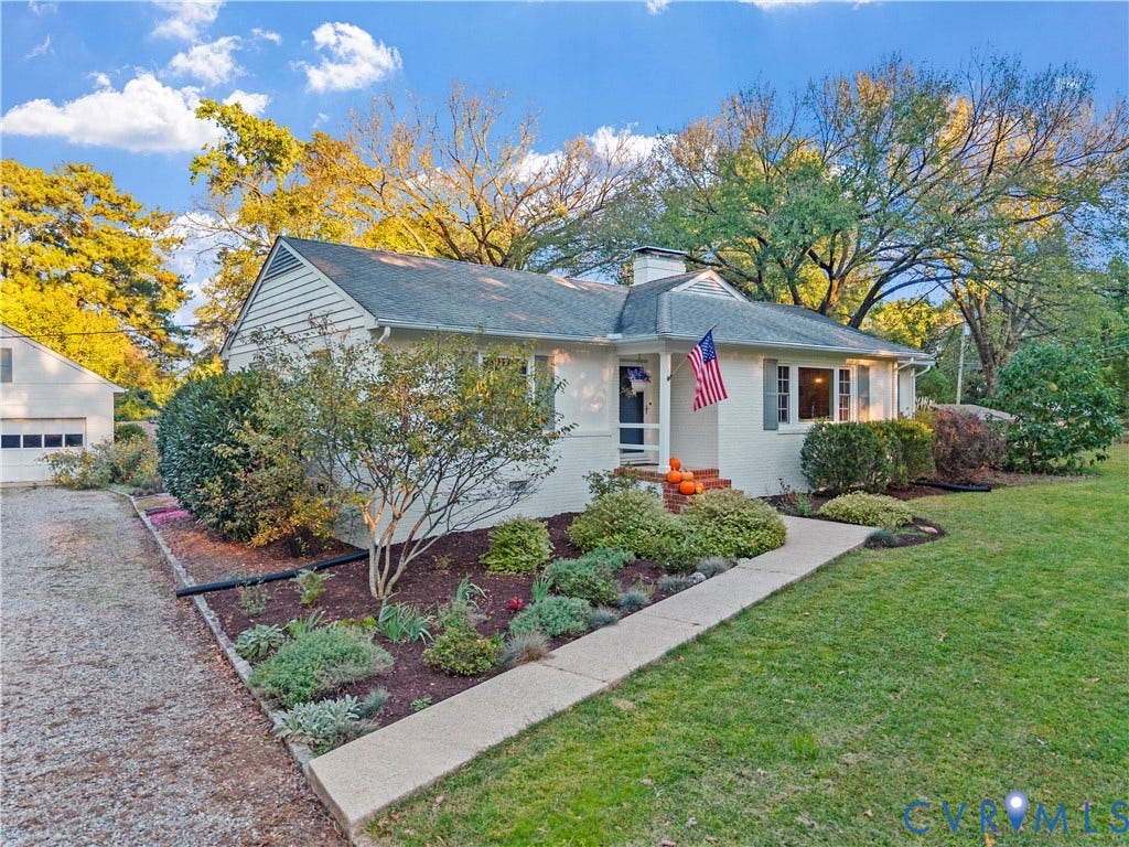 6956 Old Westham Road, Stratford Hills/Cherokee Road, Richmond, VA 23225 Painted brick exterior featuring a covered entryway, shingled roof, mature landscaping, and a gravel driveway