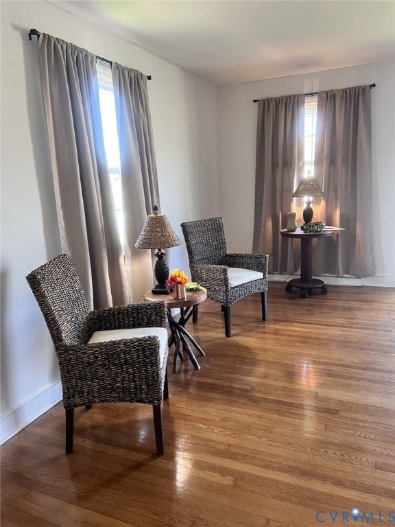 404 Ivey Avenue, Woodlawn, Colonial Heights, VA 23834 Wood-finish flooring and dual window sets with curtain rods