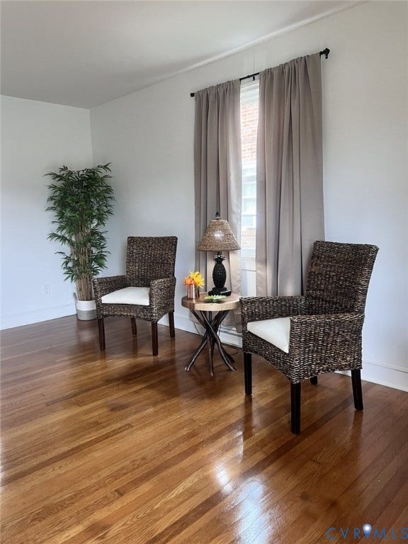 404 Ivey Avenue, Woodlawn, Colonial Heights, VA 23834 Wood-finish flooring and a single-hung window featuring a curtain rod