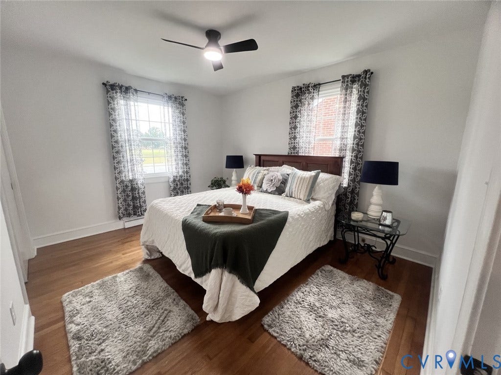 404 Ivey Avenue, Woodlawn, Colonial Heights, VA 23834 Hardwood flooring, multi-pane windows, and a ceiling fan with integrated lighting