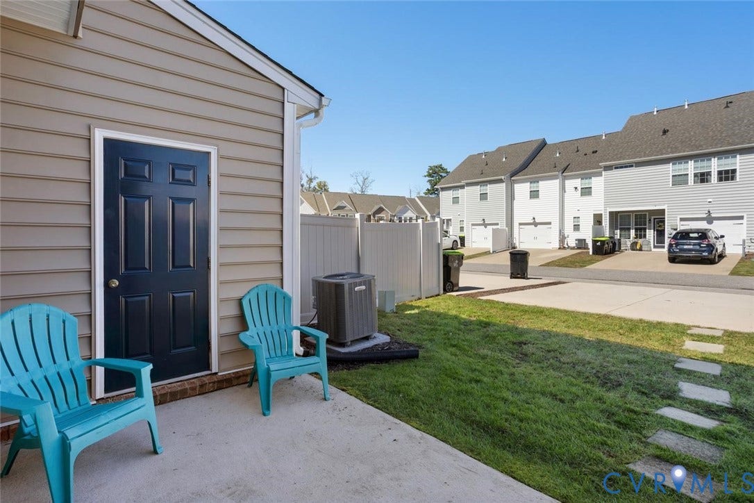 6177 Bowline Lane, Chesterfield, VA 23234 Paved patio with direct access to an exterior storage unit.