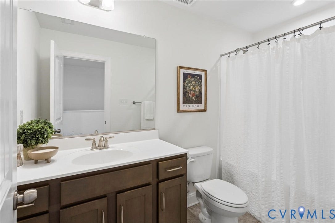6177 Bowline Lane, Chesterfield, VA 23234 Neutral, sleek, and generous sized hall bathroom.