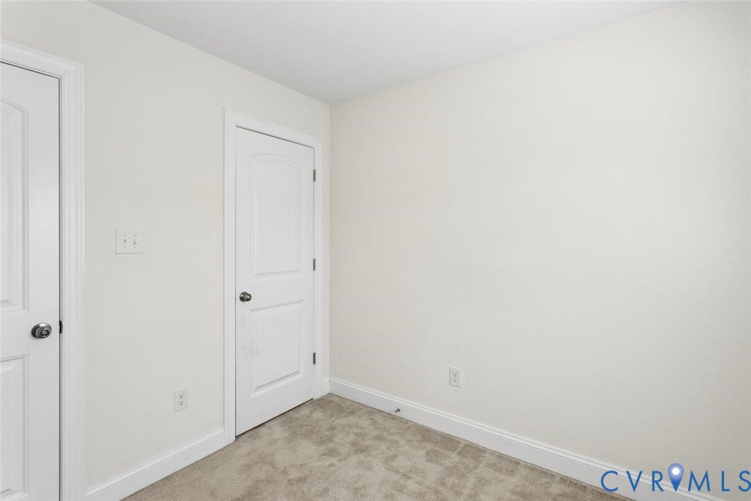 6177 Bowline Lane, Chesterfield, VA 23234 Neutral wall paint, white trim, and light carpet flooring.
