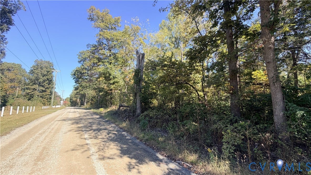 16106 Thoroughfare Road, Thoroughfare Rd, Broad Run, VA 20137 Gravel road frontage featuring mature trees and wooded landscape