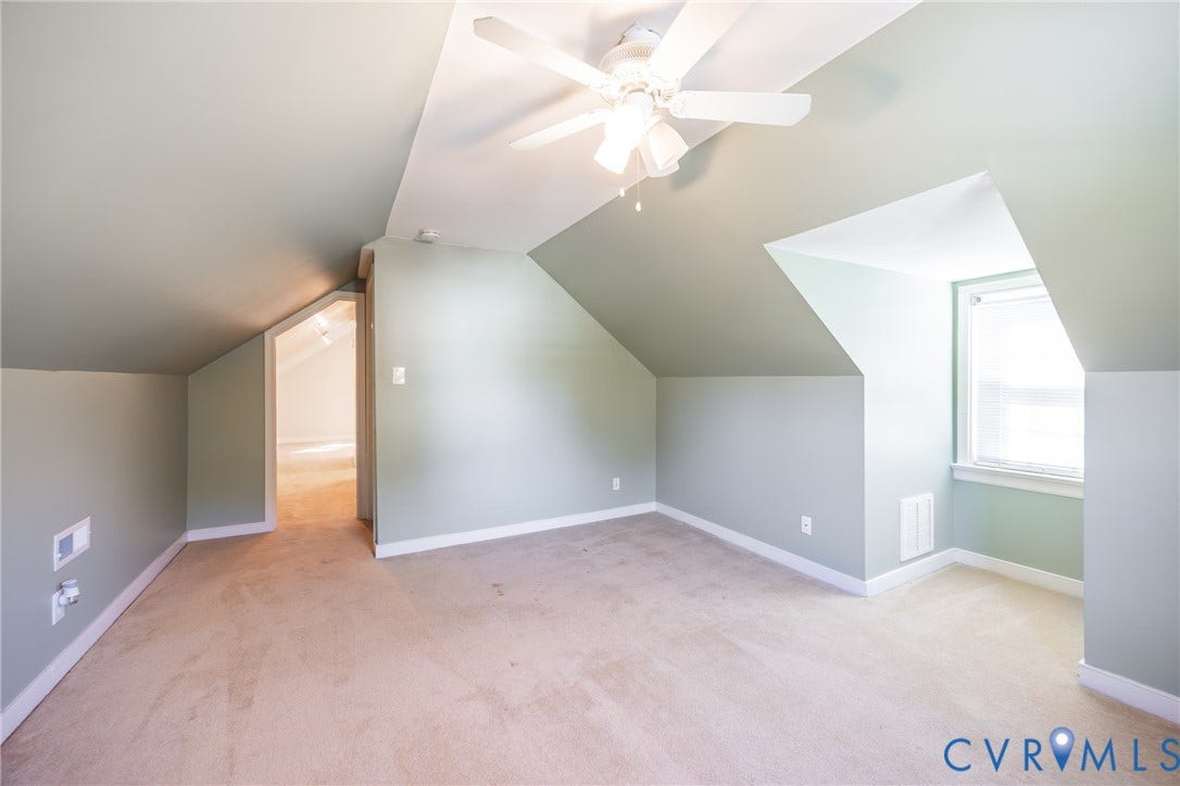 6614 Monument Avenue, Westhaven, Henrico, VA 23226 Vaulted ceiling featuring a central multi-blade ceiling fan with integrated lighting and a windowed alcove