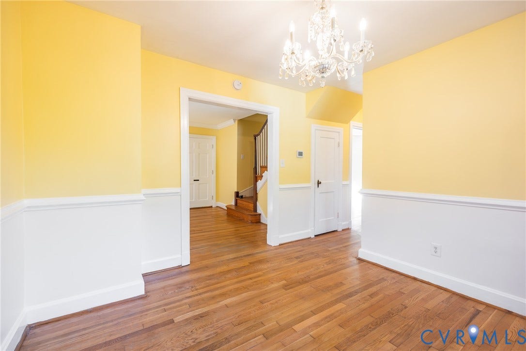 6614 Monument Avenue, Westhaven, Henrico, VA 23226 Interior space featuring wood-finish flooring, multi-panel doors, and a crystal-style chandelier
