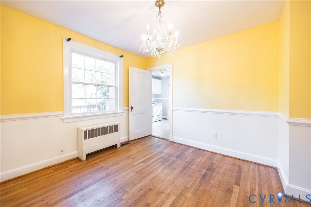 6614 Monument Avenue, Westhaven, Henrico, VA 23226 Room featuring wood-finish flooring, and a multi-light crystal chandelier