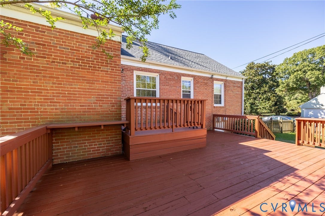 6614 Monument Avenue, Westhaven, Henrico, VA 23226 Exterior red brick siding, multi-level wood deck, built-in wooden perimeter bench, and wood railings