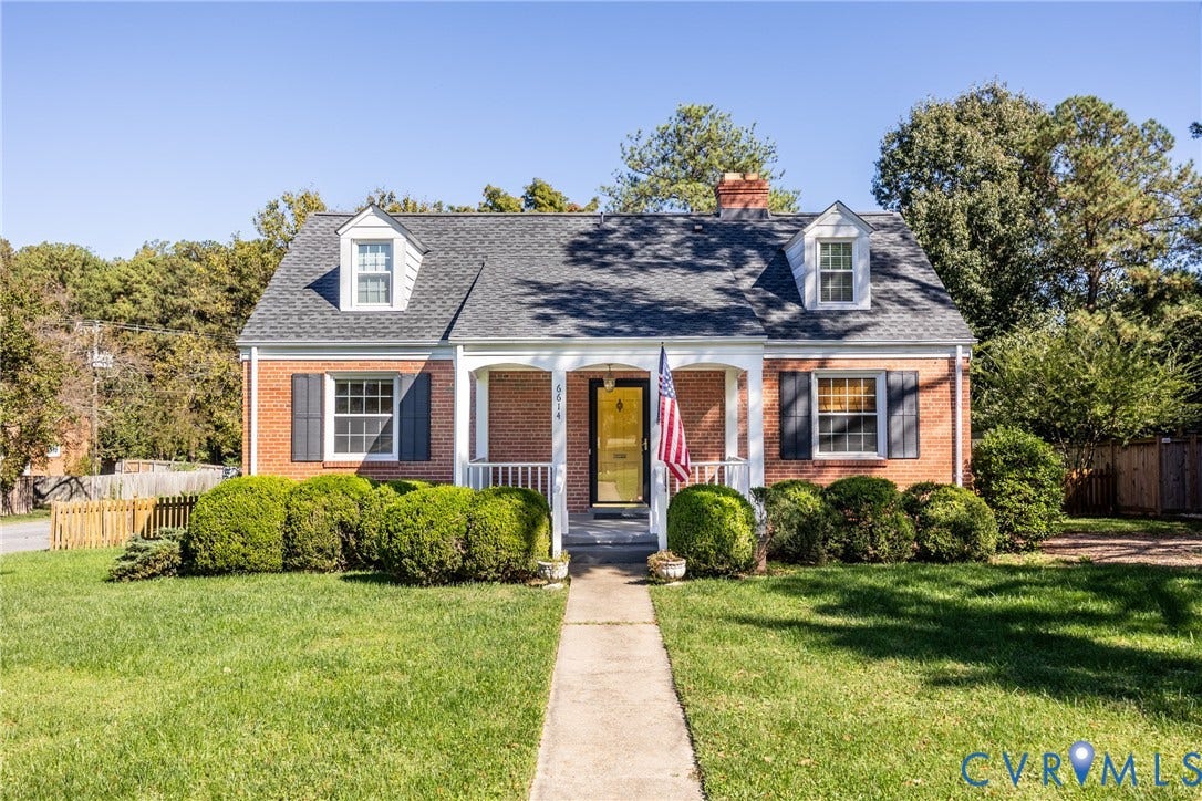 6614 Monument Avenue, Westhaven, Henrico, VA 23226 Brick exterior Cape Cod style home featuring a covered front porch, dual dormer windows, gable roof, and shuttered windows