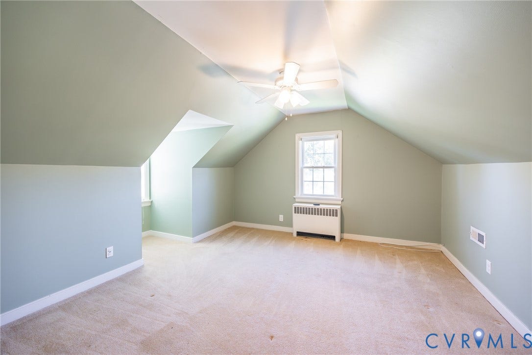6614 Monument Avenue, Westhaven, Henrico, VA 23226 Vaulted ceiling with a centrally mounted ceiling fan, wall-to-wall carpeting, and a multi-pane window