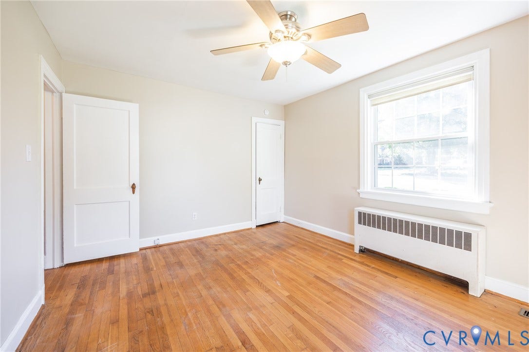 6614 Monument Avenue, Westhaven, Henrico, VA 23226 Hardwood flooring, multi-pane window with trim, central ceiling fan with integrated lighting, and two-panel interior doors