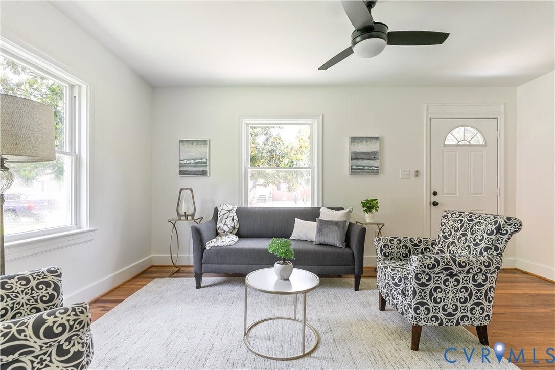 7263 Grace Lane, Mechanicsville, VA 23111 Living area featuring wood-finish flooring, white walls, and bright windows