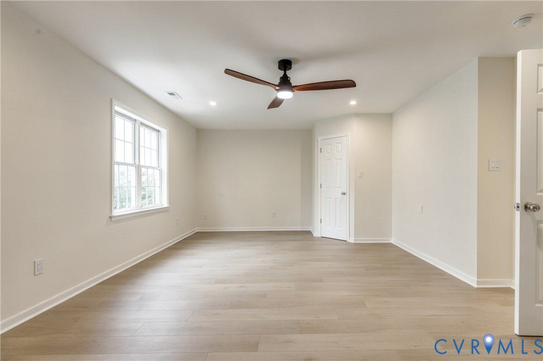 8060 Pebblepath Parkway, Hanover, VA 23111 Interior space featuring wood-finish flooring, recessed lighting, a multi-blade ceiling fan with integrated light, and a single-pane window