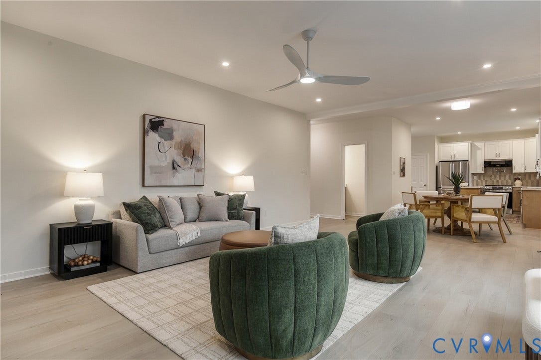 8060 Pebblepath Parkway, Hanover, VA 23111 Open-concept interior featuring wood-finish flooring, recessed lighting, and a modern ceiling fan