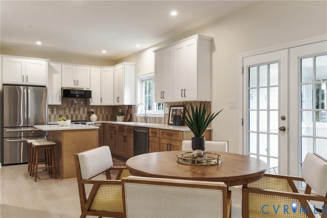 8060 Pebblepath Parkway, Hanover, VA 23111 Kitchen featuring dual-tone cabinetry, stainless steel appliances, stone-surface countertops, tile backsplash, and French doors