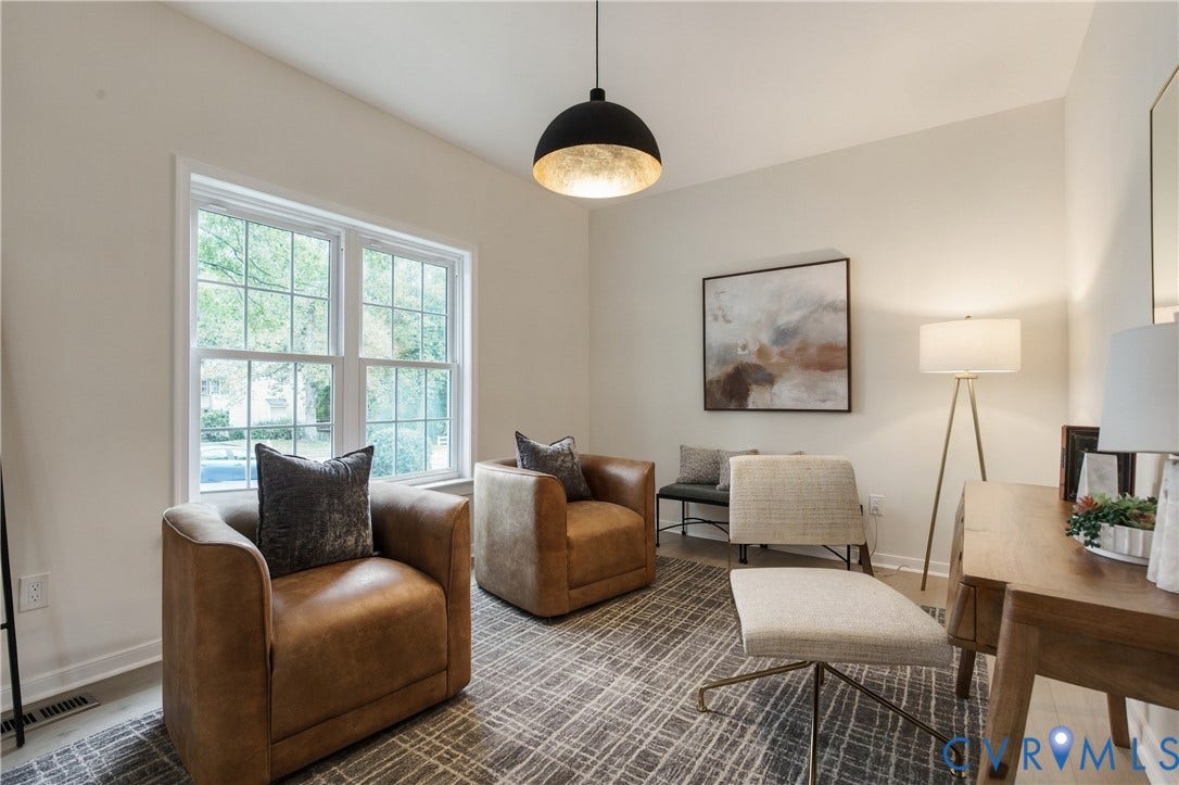 8060 Pebblepath Parkway, Hanover, VA 23111 Neutral-toned room featuring a matte black pendant light with metallic gold interior finish and double-pane window