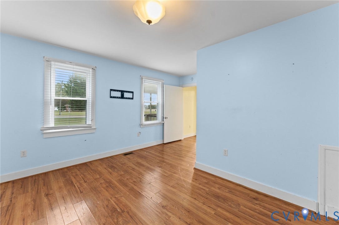 13530 Richmond Road, Village, Warsaw, VA 22572 Primary Bedroom with laminate flooring.