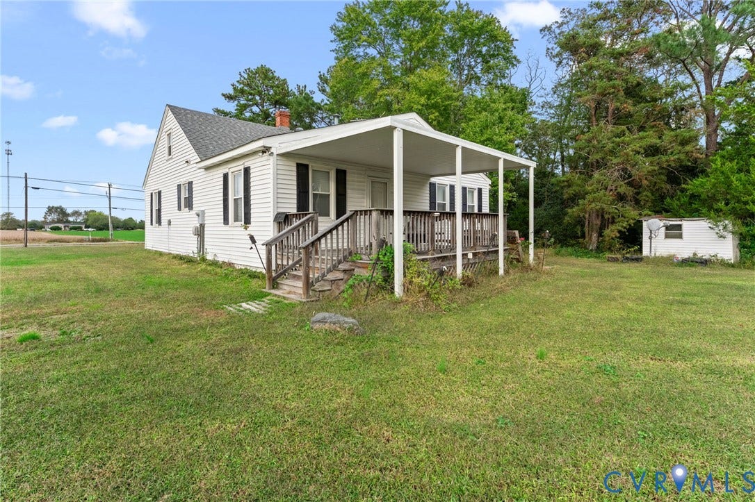 13530 Richmond Road, Village, Warsaw, VA 22572 Rear of home with covered deck.