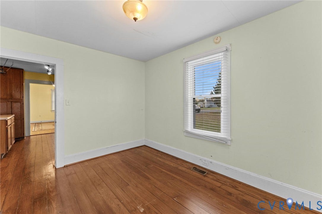 13530 Richmond Road, Village, Warsaw, VA 22572 Formal Dining Room with pine floors.