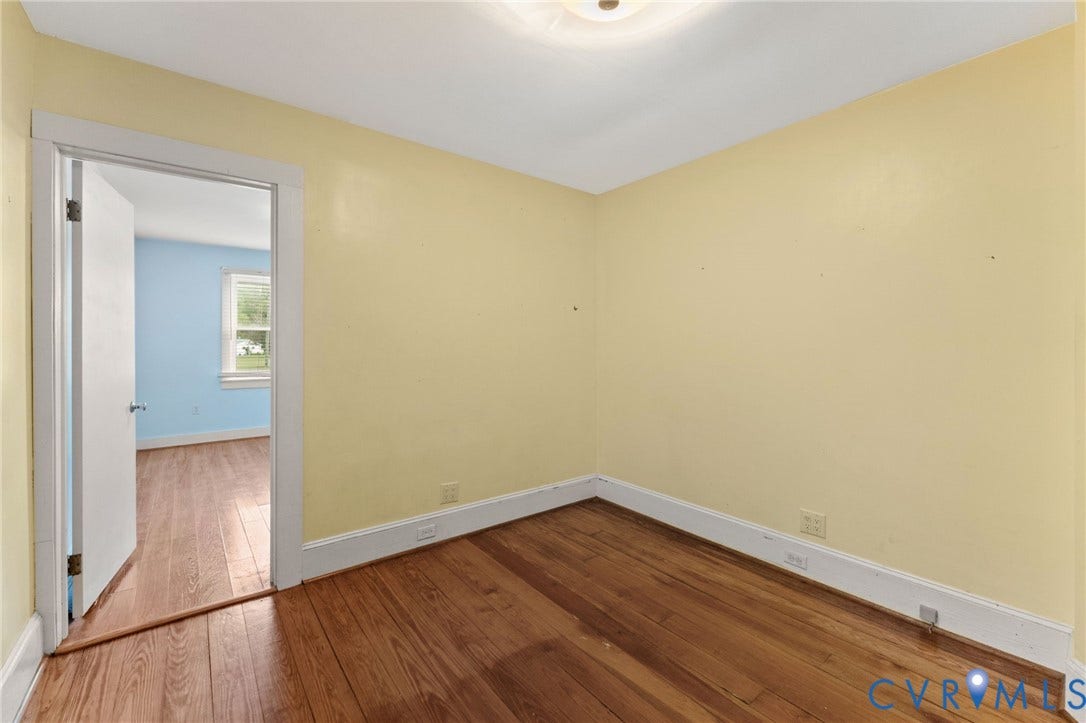 13530 Richmond Road, Village, Warsaw, VA 22572 3rd downstairs Bedroom with pine floors.