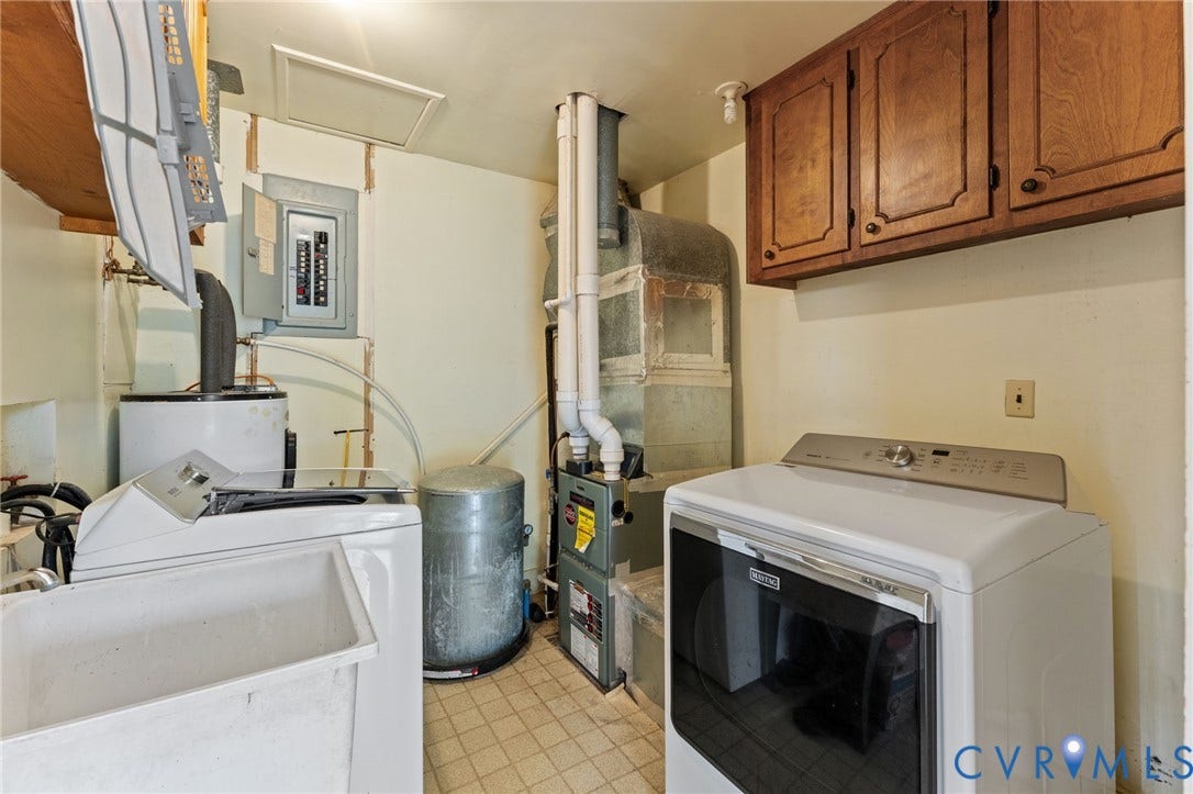 13530 Richmond Road, Village, Warsaw, VA 22572 Utility/Laundry Room with cabinets for laundry supplies & utility sink.