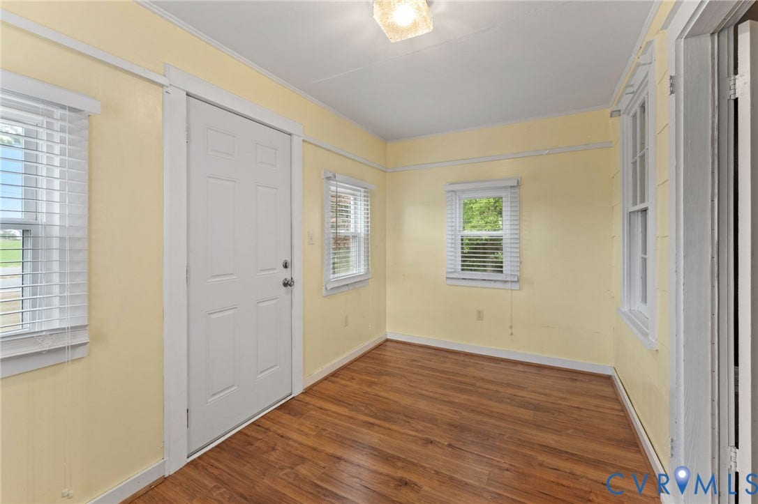 13530 Richmond Road, Village, Warsaw, VA 22572 Enclosed front porch with pine floors.