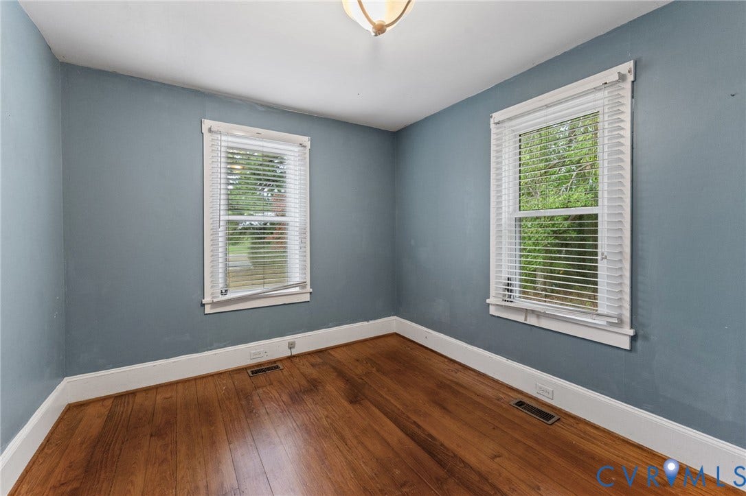 13530 Richmond Road, Village, Warsaw, VA 22572 2nd downstairs Bedroom with lovely pine floors.