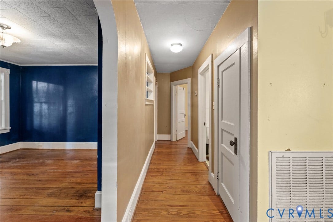 13530 Richmond Road, Village, Warsaw, VA 22572 Hallway with pine floors.