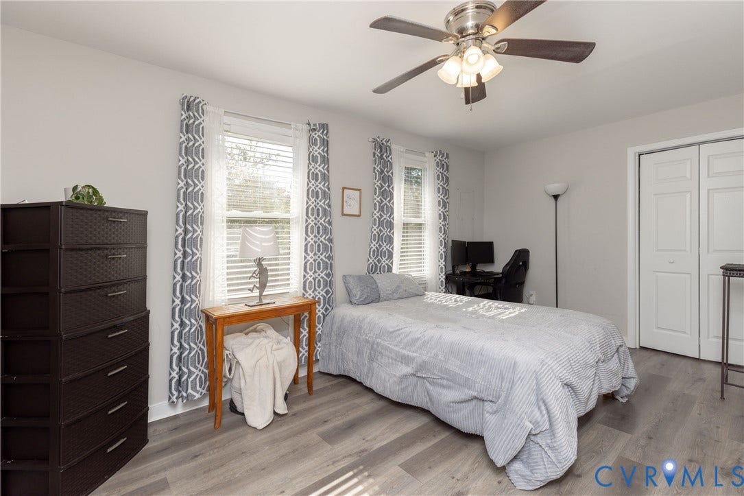 3705 Yard Arm Drive, Chesterfield, VA 23831 Wood-finish flooring, ceiling fan with integrated lighting, dual windows with blinds, and double-panel closet doors