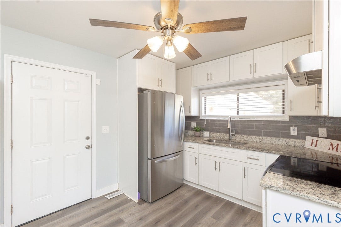 3705 Yard Arm Drive, Chesterfield, VA 23831 Kitchen featuring white cabinetry, stone-finish countertops, grey subway tile backsplash, stainless steel appliances, and wood-finish flooring