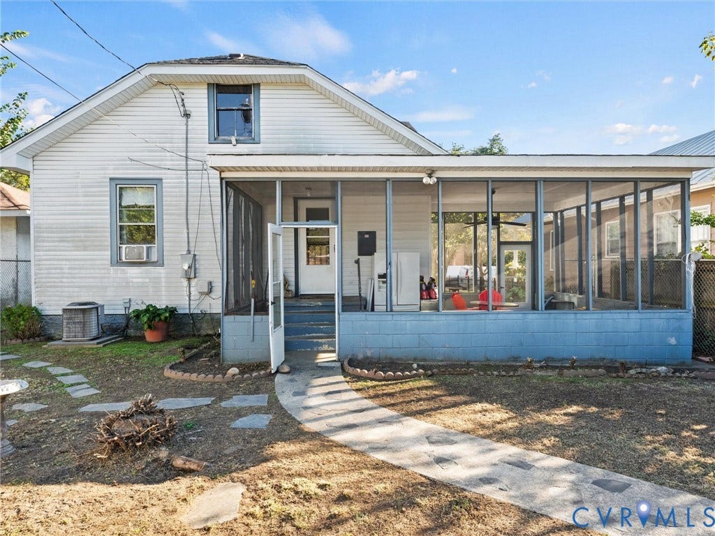 124 Suffolk Avenue, Chesterfield Highlands, Colonial Heights, VA 23834 Exterior featuring an enclosed screened-in porch with a blue block foundation, concrete walkway, and step-up entry
