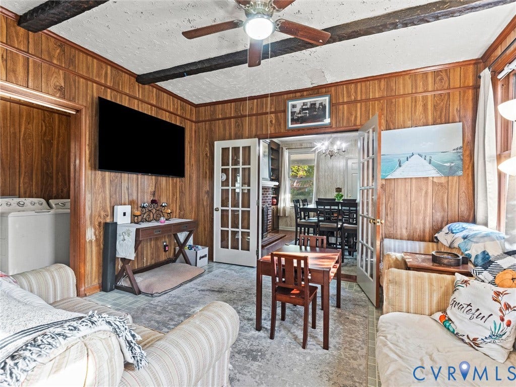 124 Suffolk Avenue, Chesterfield Highlands, Colonial Heights, VA 23834 Wood-paneled walls, exposed ceiling beams, and white-framed French doors