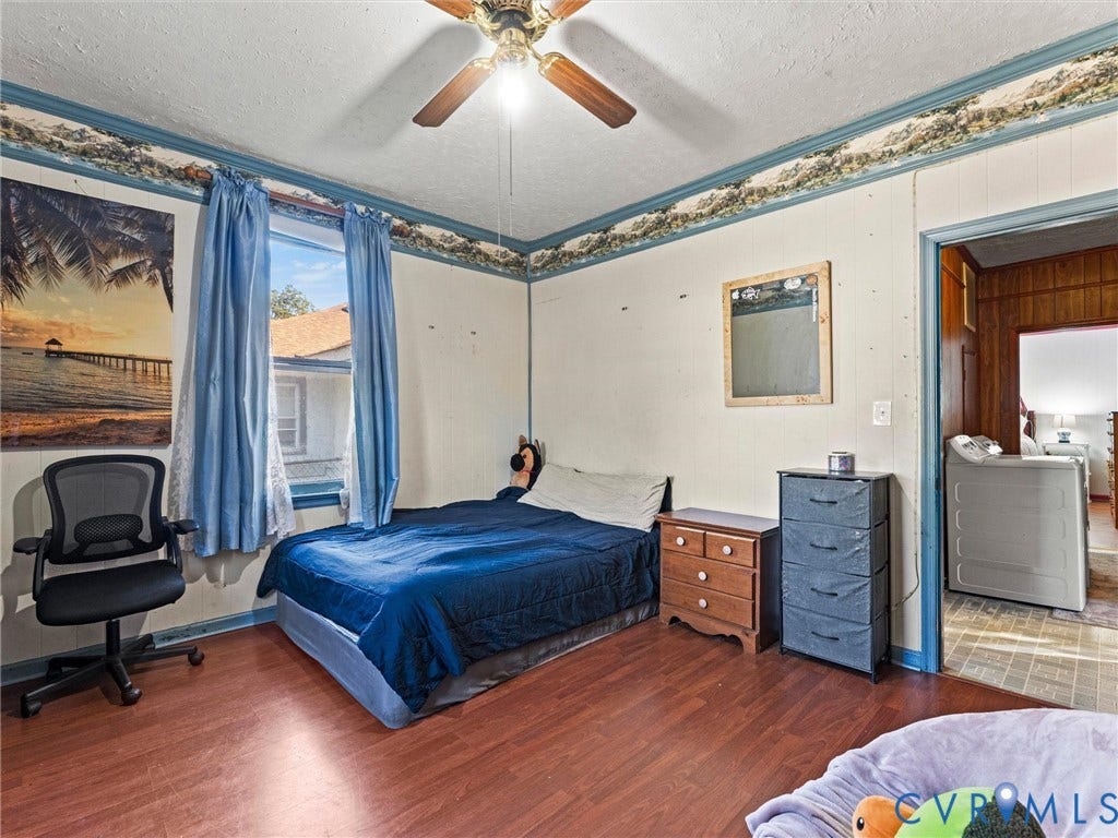 124 Suffolk Avenue, Chesterfield Highlands, Colonial Heights, VA 23834 Bedroom featuring wood-finish flooring, a central ceiling fan with integrated lighting, and decorative wall border trim