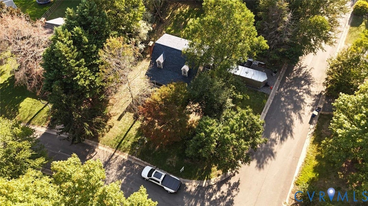 7300 Key Deer Court, Deer Run, Midlothian, VA 23112 Corner lot featuring a gambrel roofline with dormer windows, surrounded by mature trees on a landscaped parcel