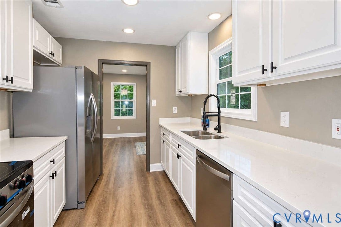 7300 Key Deer Court, Deer Run, Midlothian, VA 23112 Kitchen featuring white cabinetry with matte black hardware, stone-finish countertops, stainless steel appliances, a double-basin undermount sink with a gooseneck faucet, and wood-finish flooring