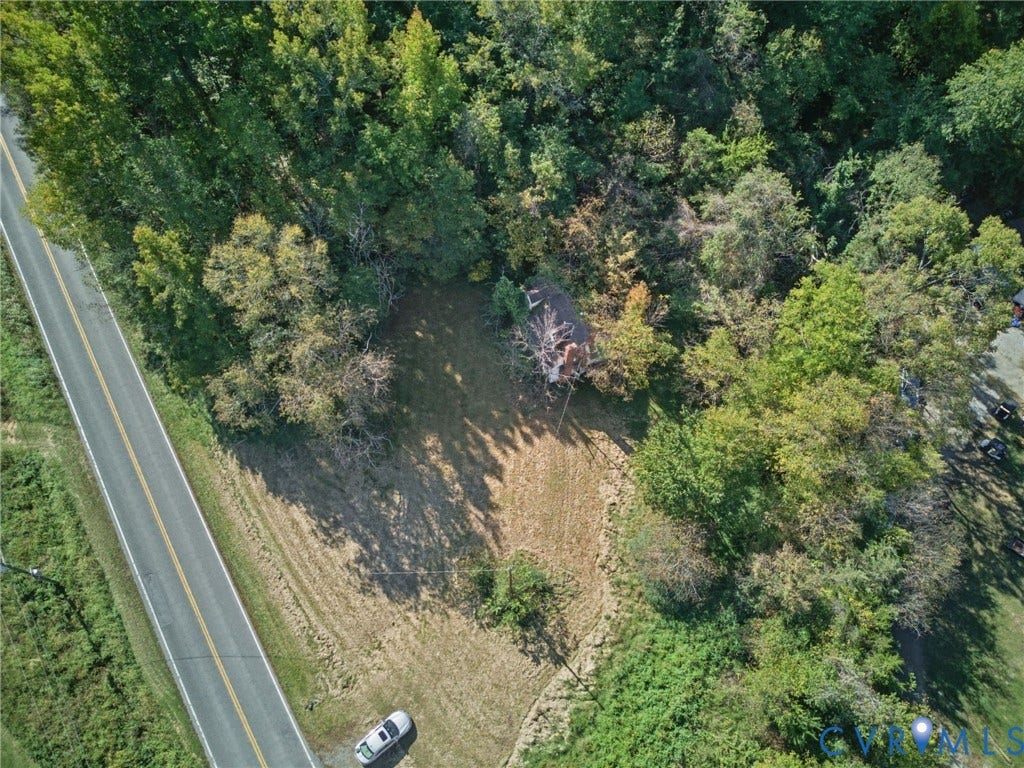 2010 Manakin Road, Sycamore Creek, Goochland, VA 23103 Aerial perspective featuring a wooded lot with cleared grass area and frontage on a paved road