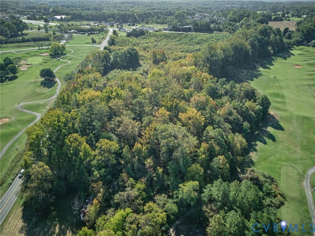 2010 Manakin Road, Sycamore Creek, Goochland, VA 23103 Expansive wooded acreage featuring mature trees and direct access to adjacent golf course fairways