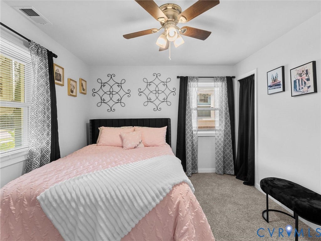 1826 Claiborne Street, Byrd Park, Richmond, VA 23220 Neutral wall finishes, plush carpeting, ceiling fan with integrated lighting, and dual windows with wide-slat blinds
