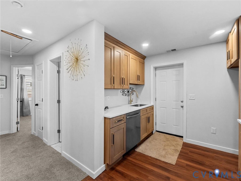 1826 Claiborne Street, Byrd Park, Richmond, VA 23220 Kitchenette featuring wood cabinetry, white countertops, an undermount stainless steel sink, a stainless steel dishwasher, and recessed lighting