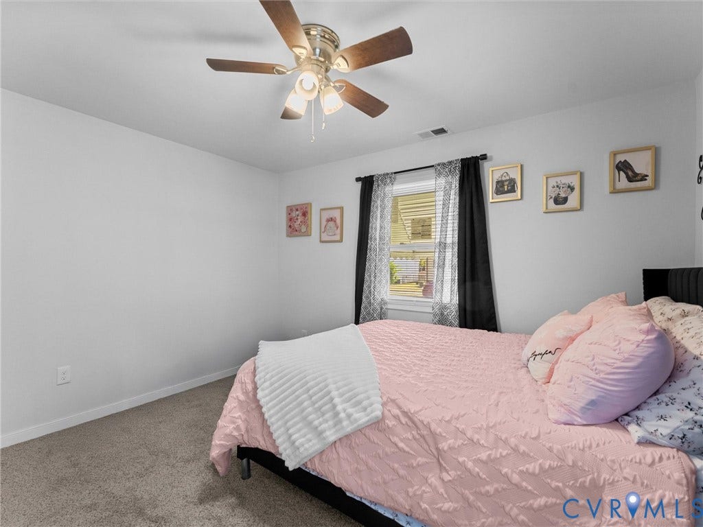 1826 Claiborne Street, Byrd Park, Richmond, VA 23220 Room featuring neutral wall-to-wall carpeting, a ceiling fan with integrated lighting, and a window with neutral wall finishes