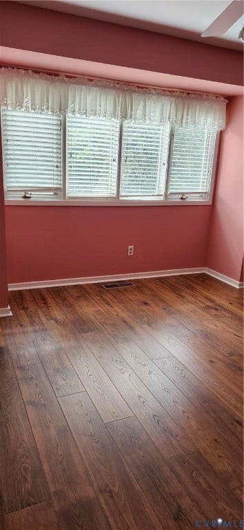 12400 New Point Drive, Wilde Lake, Henrico, VA 23233 Wood-finish flooring, multi-panel window configuration with adjustable blinds, and integrated ceiling trim