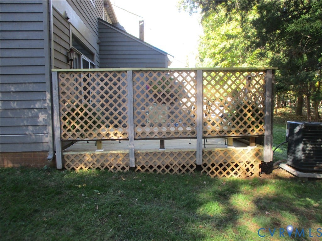 12400 New Point Drive, Wilde Lake, Henrico, VA 23233 Back deck featuring wood lattice screen panels and latticed skirting