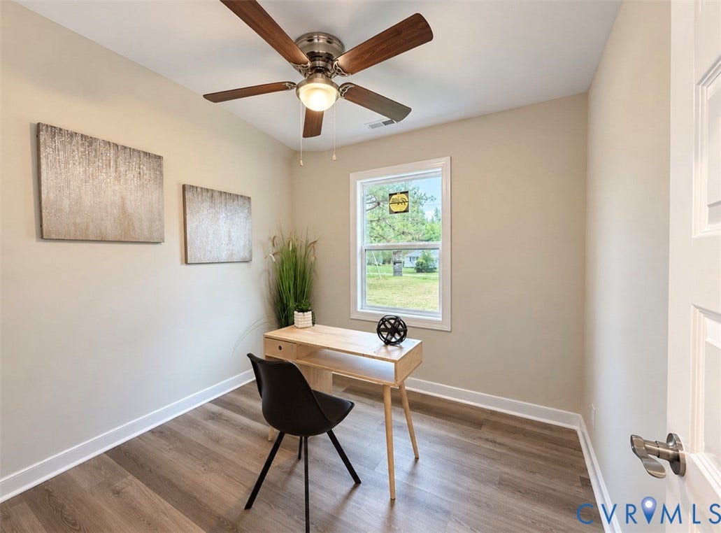 2800 Harris Hill Road, Dunnsville, VA 22454 Wood-finish flooring, ceiling fan with integrated light fixture, and single-pane window