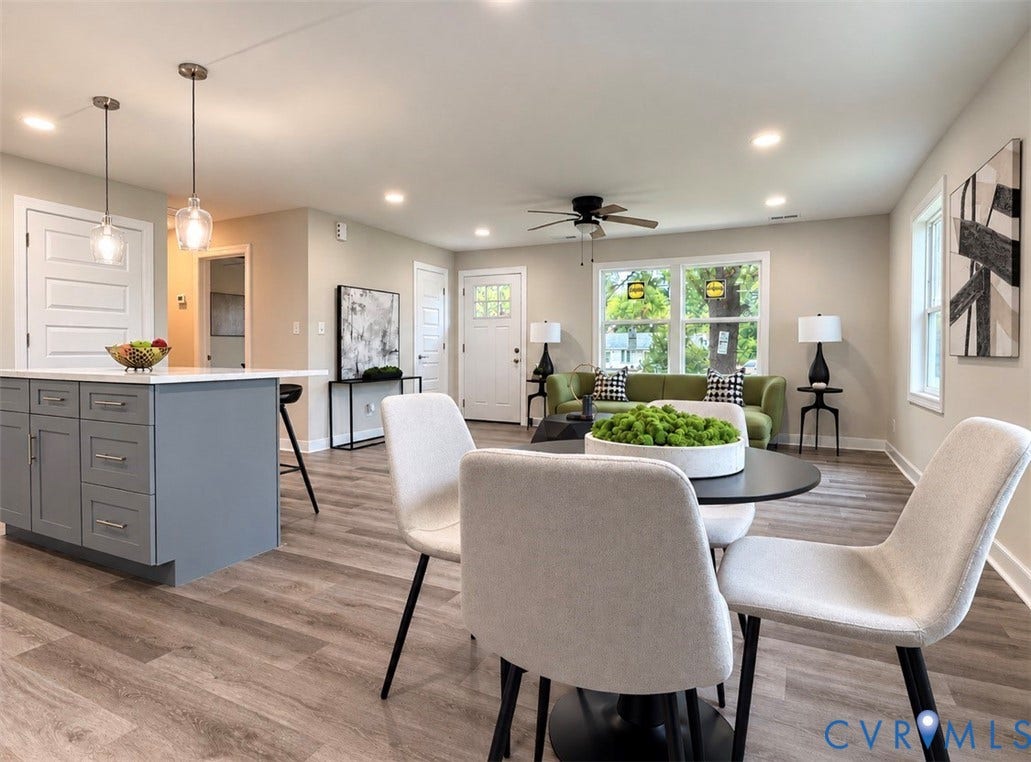 2800 Harris Hill Road, Dunnsville, VA 22454 Open-concept interior featuring wood-finish flooring, a kitchen island with gray cabinetry, recessed lighting, dual glass pendant lights, and a central ceiling fan